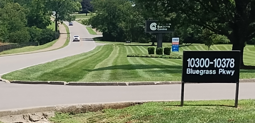 A sign that has the location entrance